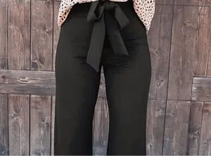 Black high waist front tie flared pants.